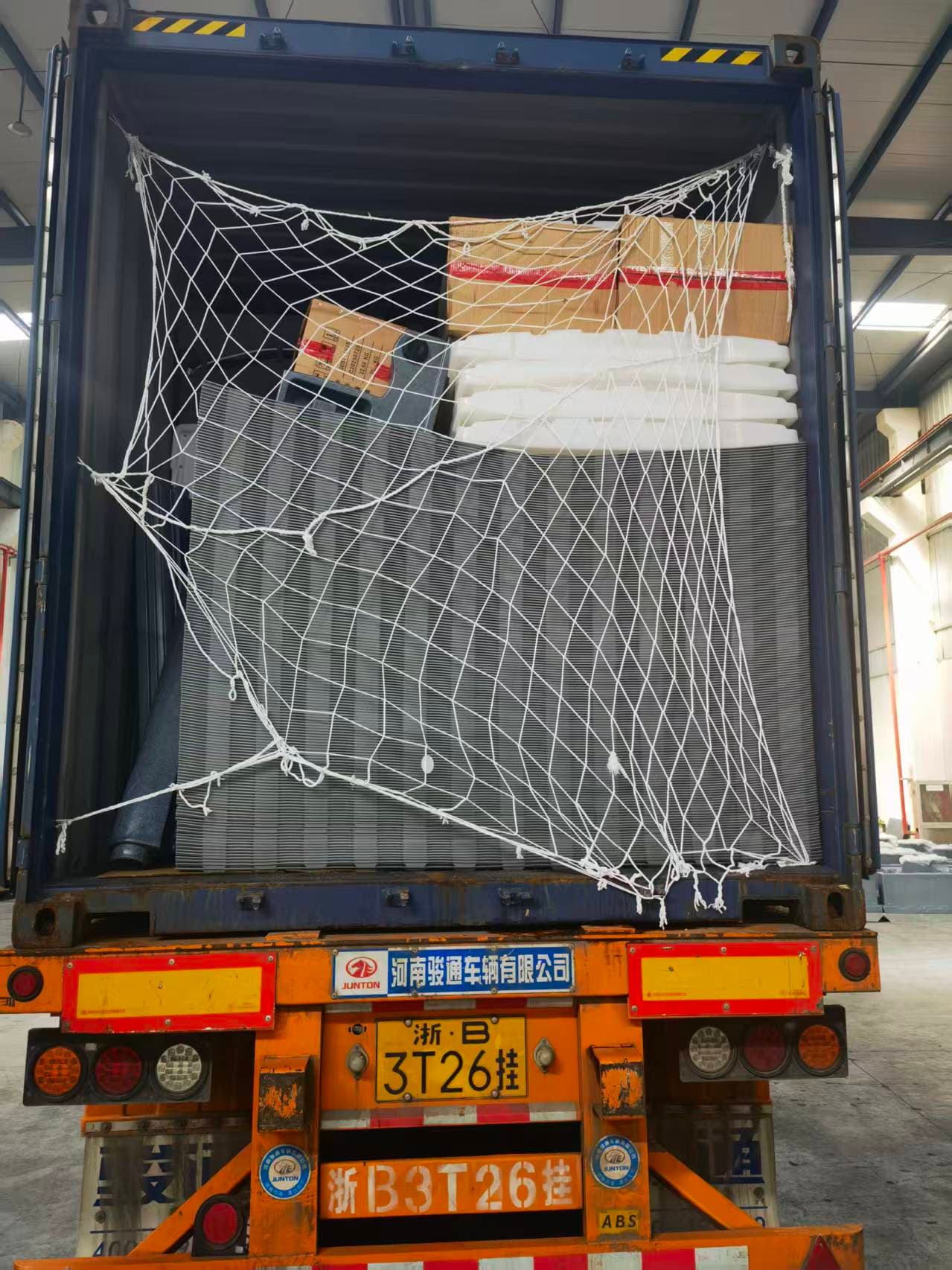 Portable toilet components protected and arranged for container loading
